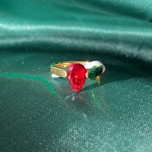 Gold Stainless Steel Ring With A Red Teardrop Gem